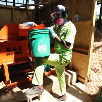 One of SOIL's team members rocking protective equipment to keep dust out of his eyes while hard at work with our new bonzodè grinder