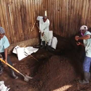 SOIL’s compost team working at compost site