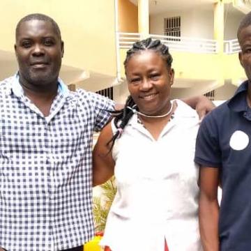 SOIL Co-founder Baudeler Magloire with Rea Dol and partners preparing emergency response supplies.