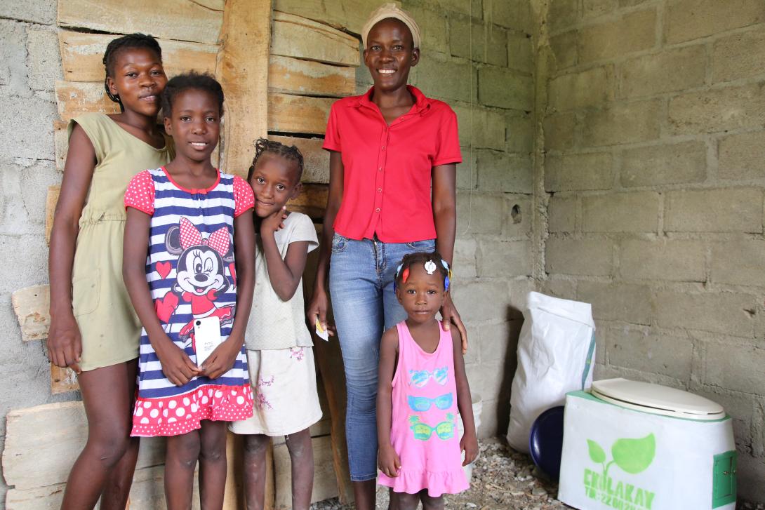 Family with Household Toilet