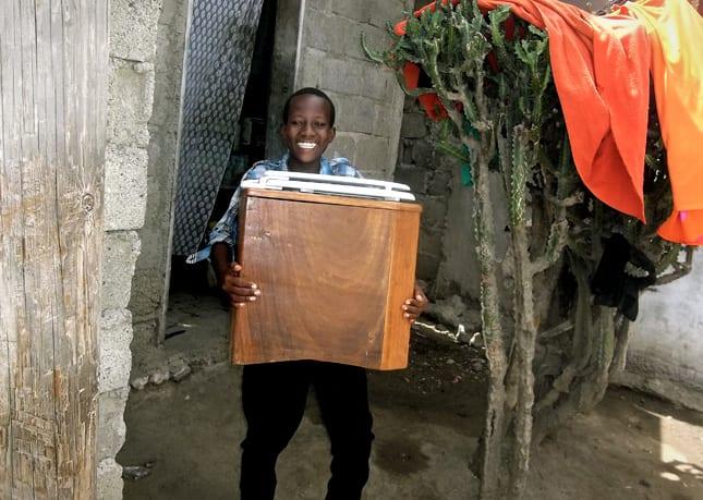 Boy with Composting Toilet