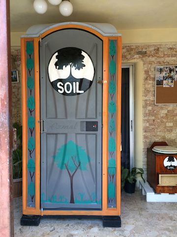 A SOIL toilet made from a converted port-a-potty.