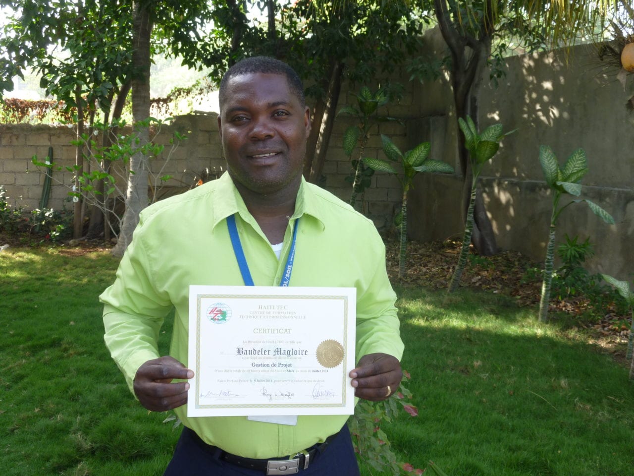 Bobo shows off his certificate from his recently completed Project Management course.