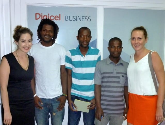Digicel's Ivy Kuperberg with members of SOIL's marketing team: Jimmy, Lafalaise, Herve, and Shannon